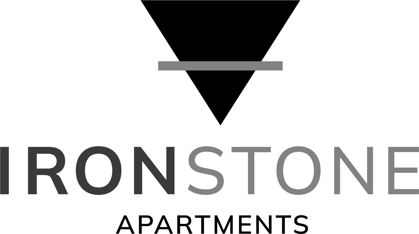 Ironstone apartments logo with a black and green background.